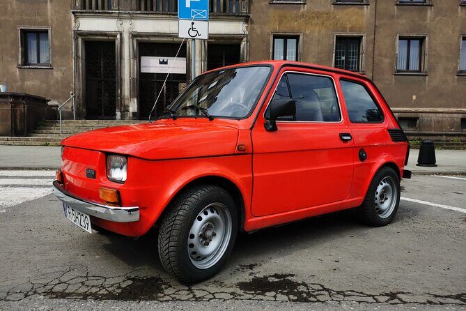 1.5h Crazy Guides' Communism Tour of Nowa Huta in Classic Car - Stop 1: Plac Centralny im. R. Reagana and the Soviet-Style Renaissance Houses