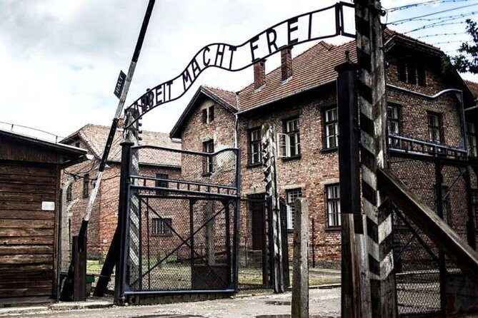 Auschwitz-Birkenau guided tour from Krakow - private car - Auschwitz I: the gate, barracks, and the story you can follow