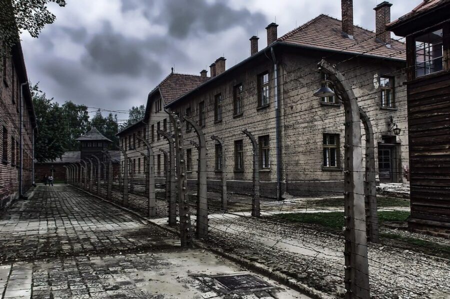 Auschwitz-Birkenau: Memorial Entry Ticket and Guided Tour - Auschwitz I: the gate, the barracks, and why the layout matters