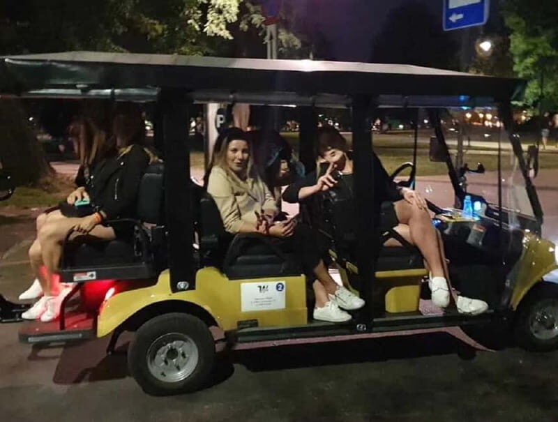 City Tour Cracow golf car plus Cruise on the Vistula River. - The one-hour Vistula River catamaran cruise with 27-language audio