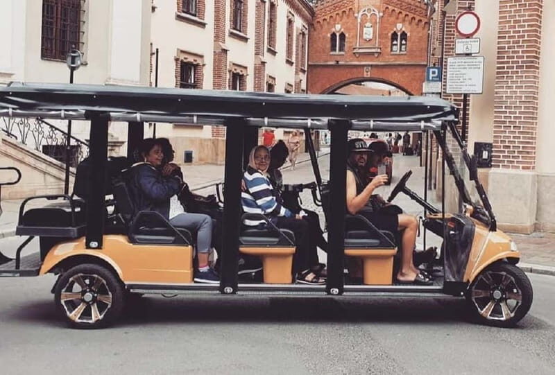 City Tour Cracow golf car plus Cruise on the Vistula River. - Main Market Square, Town Hall, and Collegium Maius