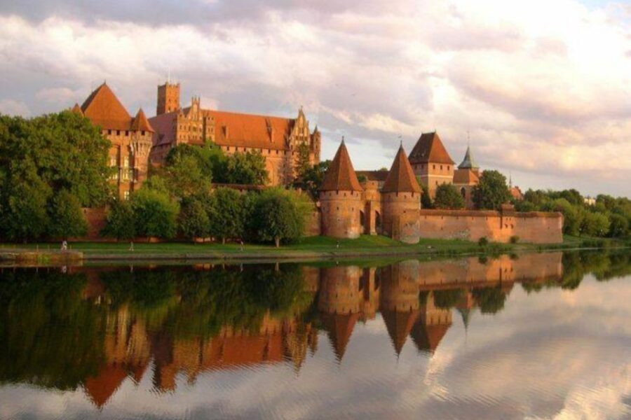 From Gdansk: Malbork Castle Trip with Ticket and Audio Guide - Inside Malbork Castle: Why This UNESCO Fortress Feels So Big