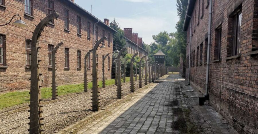 From Krakow: Auschwitz-Birkenau Camp Complex Guided Day Trip - First Impressions at Auschwitz: The Gate and the Meaning of Everyday Objects