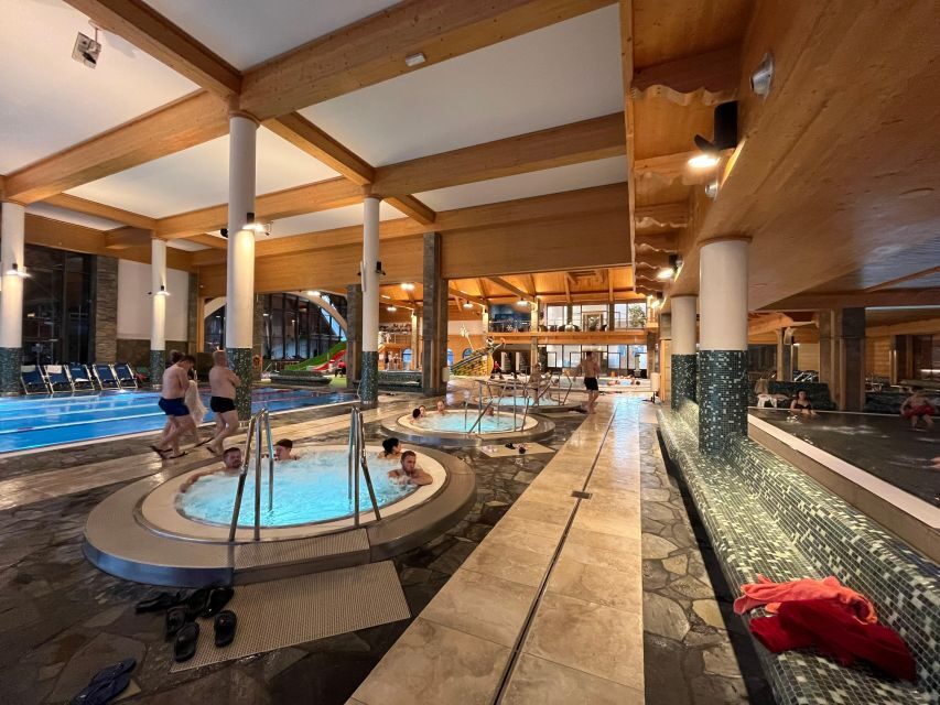 From Krakow: Zakopane City Tour with Thermal Baths - Chocholow wooden houses and local food that feels lived-in