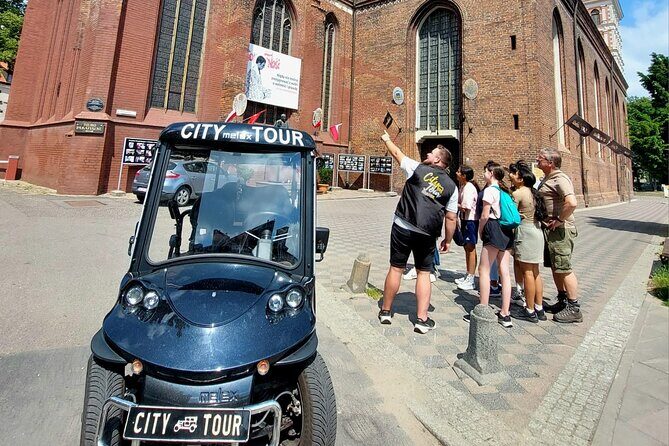 GDANSK City Tour by Golf Cart Live Guide & City Sightseeing 90min - Hala Targowa and the religious landmarks: from Gothic brick to baroque side chapels