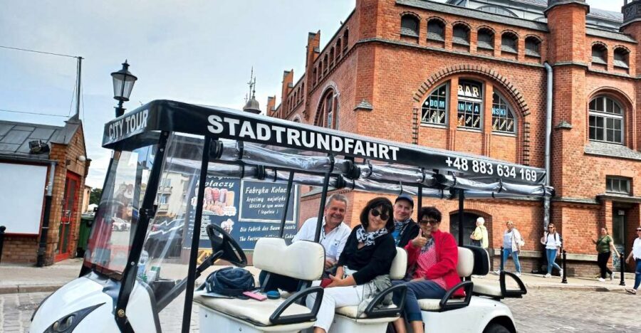 Gdansk: City Tour Live Guided by Golf Cart/Buggy Sightseeing - Where you meet and how pickup works near Neptune’s Fountain