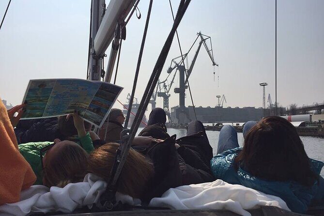 Gdańsk: Motlawa and Port yacht cruise with Welcome Drink - Decks, blankets, and the welcome drink you’ll feel right away