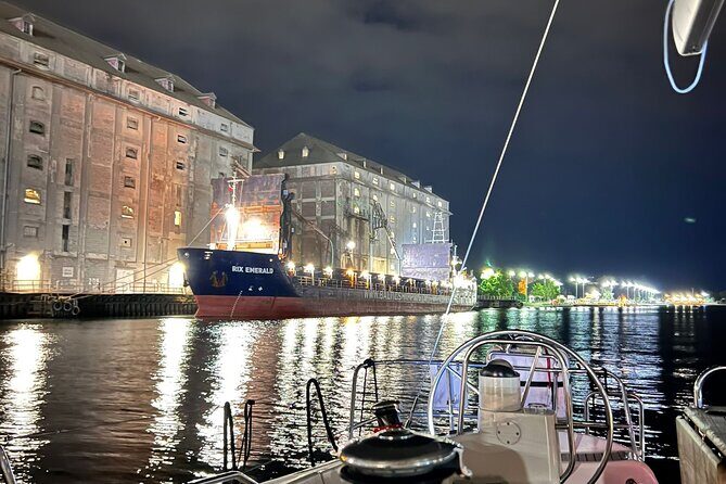 Gdansk: Scenic Evening Yacht Cruise with Welcome Drink - Remontowa Shipyard, Wisłoujście Fortress, and Westerplatte: history plus industry angles