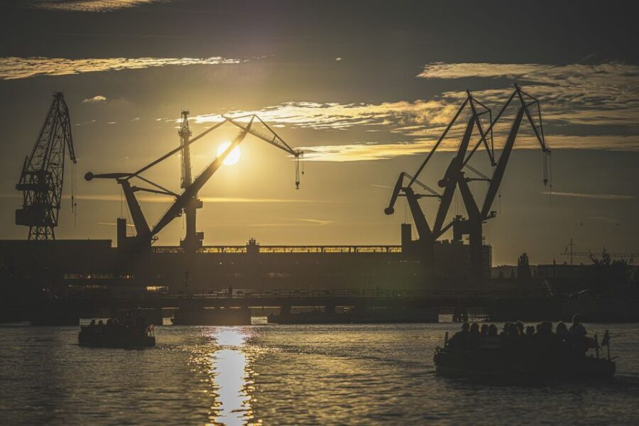 Gdańsk: Sunset Cruise on a Historic Polish Boat - The shipyard and Granary Island: specialist vessels and up-close crane views