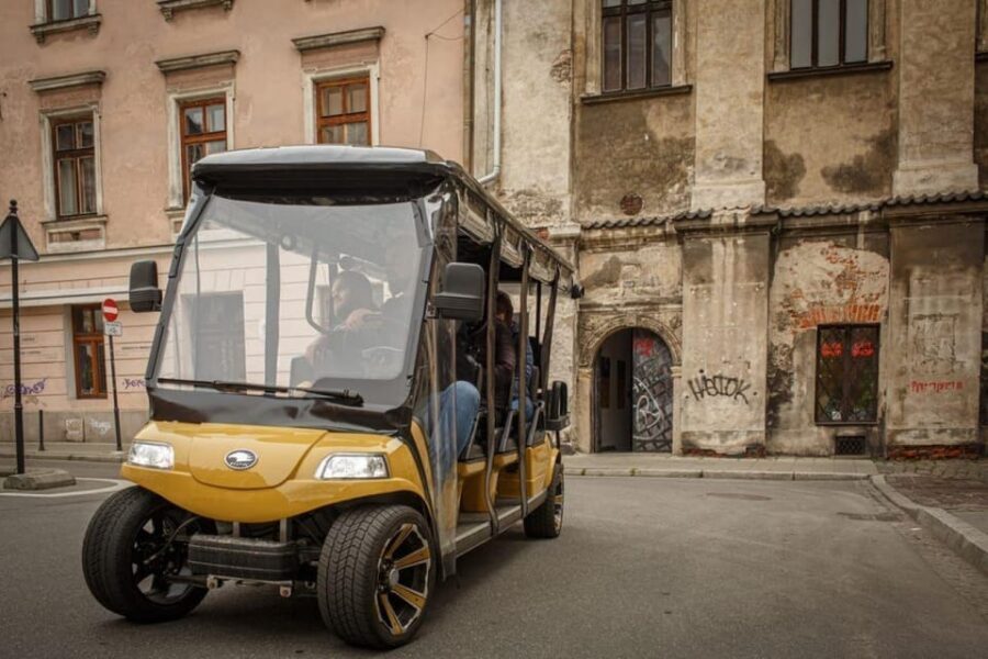 Krakow: Golf Cart City Sightseeing Tour By Old Town District - How the multilingual audio system keeps everyone oriented