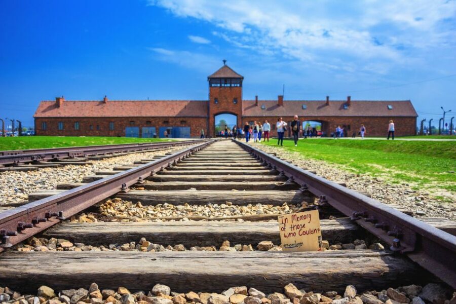 Krakow: Guided Auschwitz Birkenau Tour - Crossing to Birkenau: the shift from museum rooms to vast, exposed reality