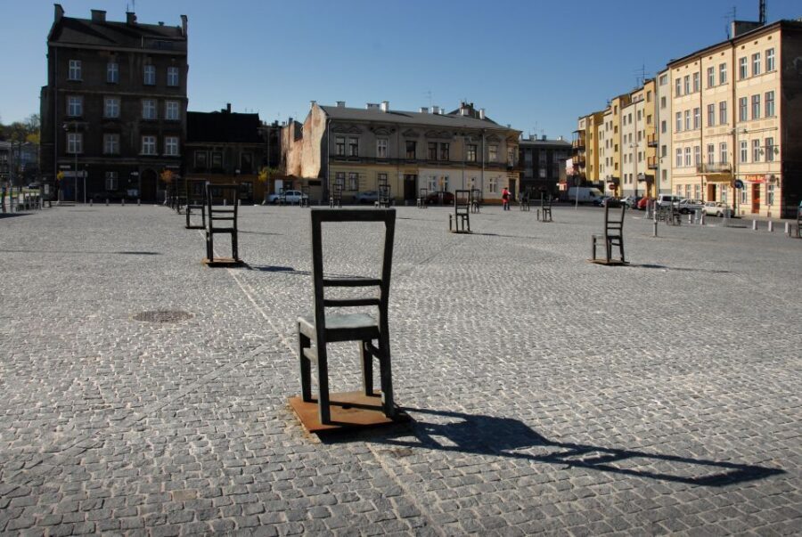 Krakow: Jewish Ghetto Guided Walking Tour - Preserved wartime streets: noticing how life changed, step by step