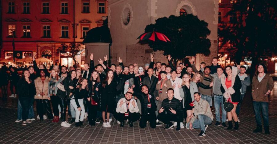 Krakow: Pub Crawl with 1 Hour of Unlimited Alcoholic Drinks - Meeting at St. Wojciech Church: Find the Red-and-Black Umbrella