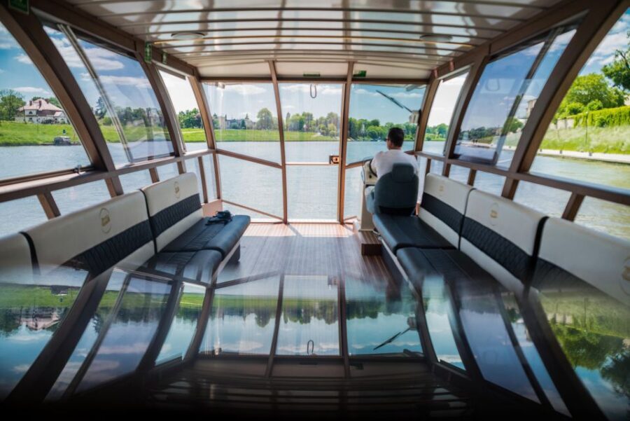 Krakow: Sightseeing Cruise on Vistula River with Audio Guide - The catamaran setup: open-air views plus heated comfort
