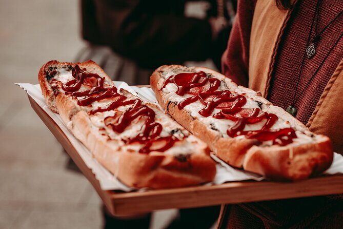 Krakow Tipsy Polish Food Tour with History Pierogi and Shots - Kraków Main Square: the orientation stop that matters