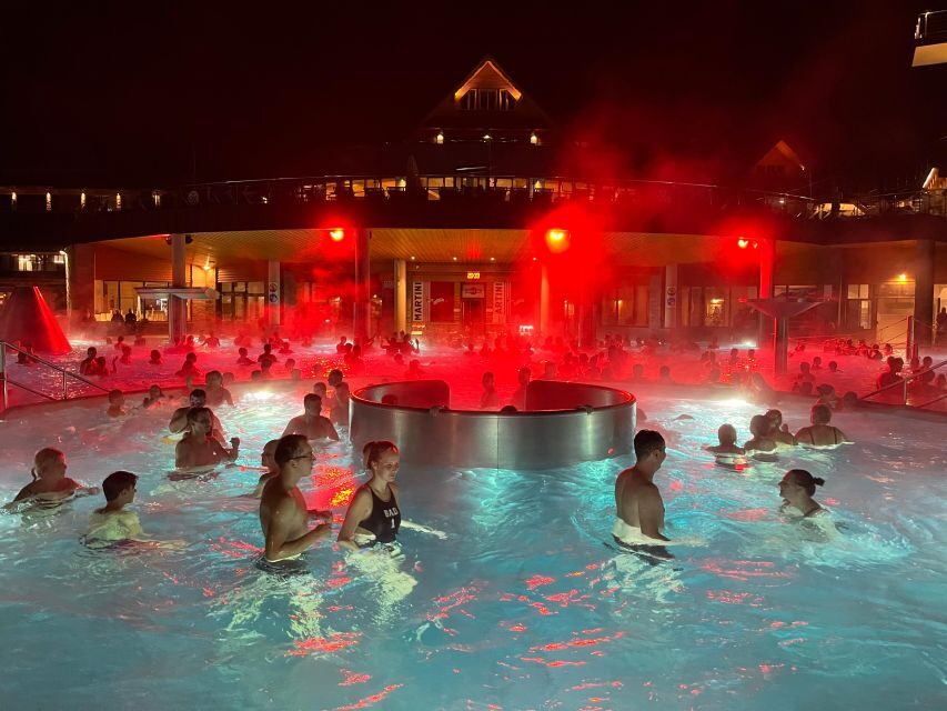 Krakow: Trip to Chocholow Thermal Baths in Tatra Mountains - Crowds, timing, and the seasonal trap-door slide detail