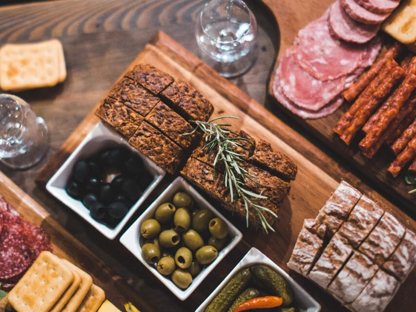 Krakow: Vodka Tasting Tour: Tapas, Tipsy Tales & Hidden Gems - Stop One: Tapas, Breads, and Two Clear Vodkas With a Vodka Crash Course