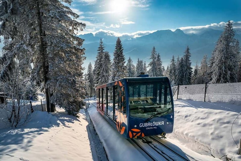 Krakow: Zakopane, Snowmobiles, Cable Car & Hot Springs Tour - Chochołów and Your Oscypek Cheese Tasting Stop