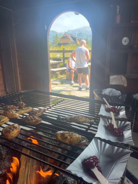 KRAKOW ZAKOPANE TOUR CABLE CAR THERMAL BATHS & HOTEL PICKUP - Oscypek over open fire: the food moment that makes the trip feel local