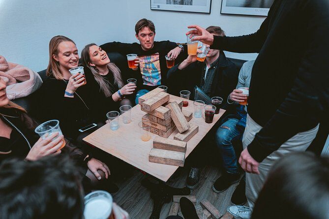 Pub Crawl + Unlimited Drinks + VIP entry + Drinking Games & Photographer - Stop 1: how the night gets going (wristbands, games, and the first bar)