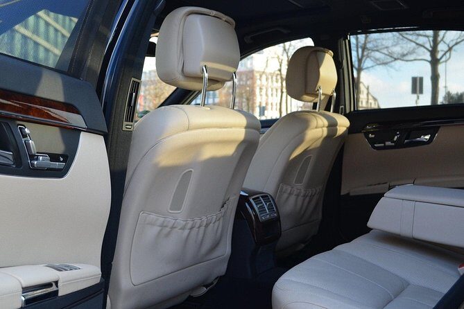 Rent a car with the driver - Pickup That Actually Works: Airport or Seaport, With a Real Welcome Sign