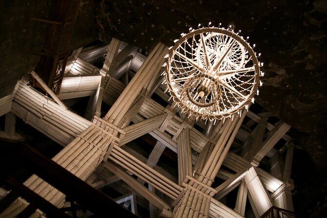 Salt Mine Wieliczka Guided Tour from Krakow - What You’ll See 140 Meters Down: Carvings, Statues, and Mining Machines