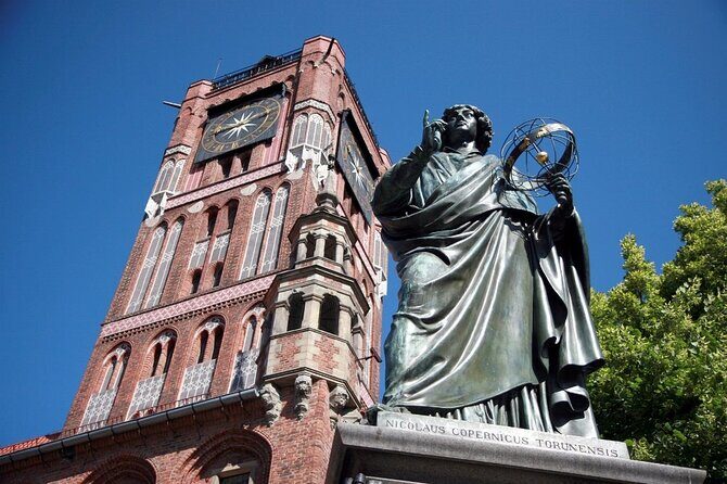 Torun Old Town Highlights Private Walking Tour - Leaning tower, defensive walls, and Teutonic-era leftovers