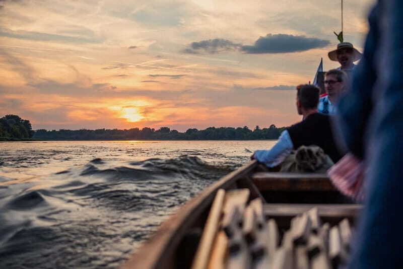 Toruń: Sunset on the Vistula From a Traditional Boat. - The traditional wooden boat, and why size matters